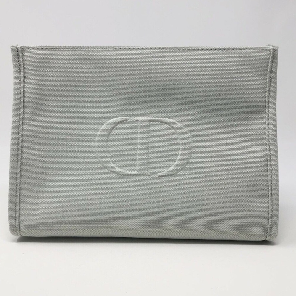 Grey Christian Dior cosmetic pouch